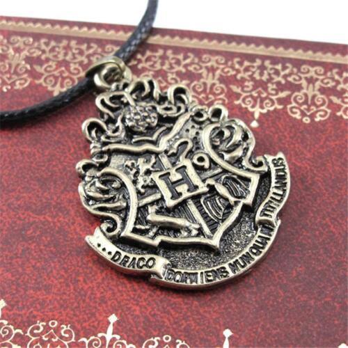 HARRY POTTER Harry Potter Hogwarts Houses Gryffindor Ravenclaw Hufflepuff Slytherin Necklace - Homeware Discounts
